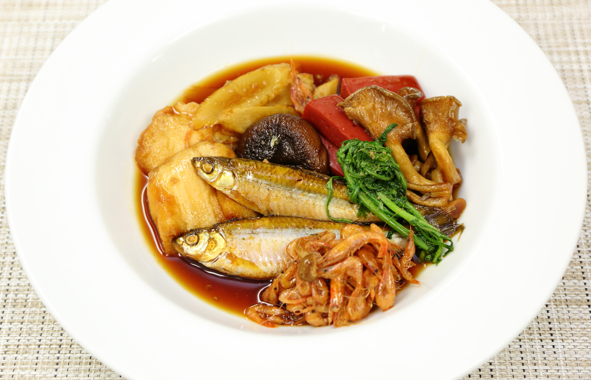 Junjun with two of Lake Biwa’s rare fish, Chojifu and red konjac