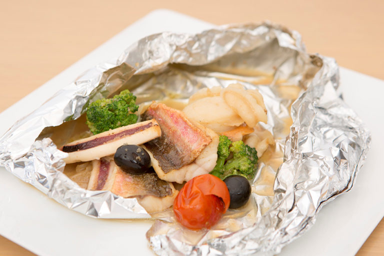 Sanriku seafood and seasonal vegetables in aluminum foil, acqua pazza style